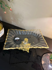 Rectangular platter with gold ends and gold intricate stand